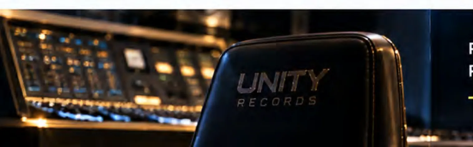 A Unity Records mixing console and studio chair